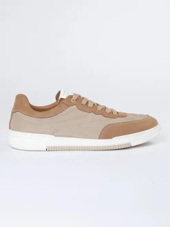 Skórzane sneakersy w kolorze beżowym