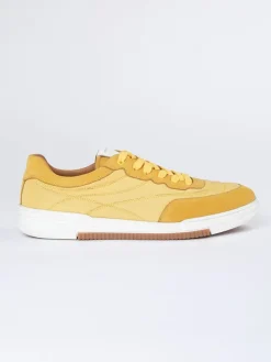 Skórzane sneakersy w kolorze żółtym